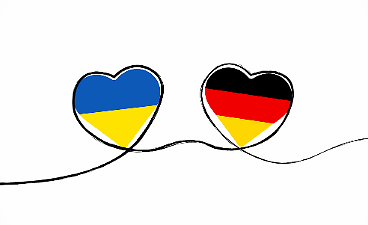 Zwei Herzen mit deutscher und ukrainischer Flagge