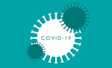 Ein Bild des Covid-19-Viruses in Weiß auf grünem Hintergrund mit der Beschreibung Covid-19.